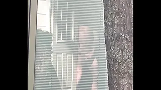 Watching my neighbor masturbate